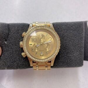 Nixon Watch Gold Dial Chronograph.